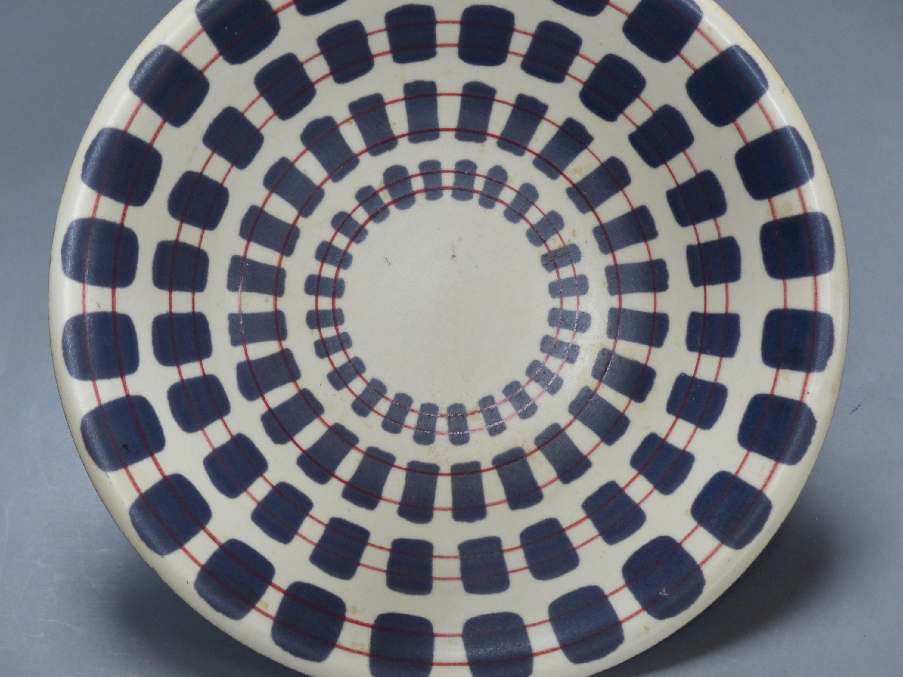 A Poole pottery dish and a set of six Broadhurst Harlem cup, saucers and plates